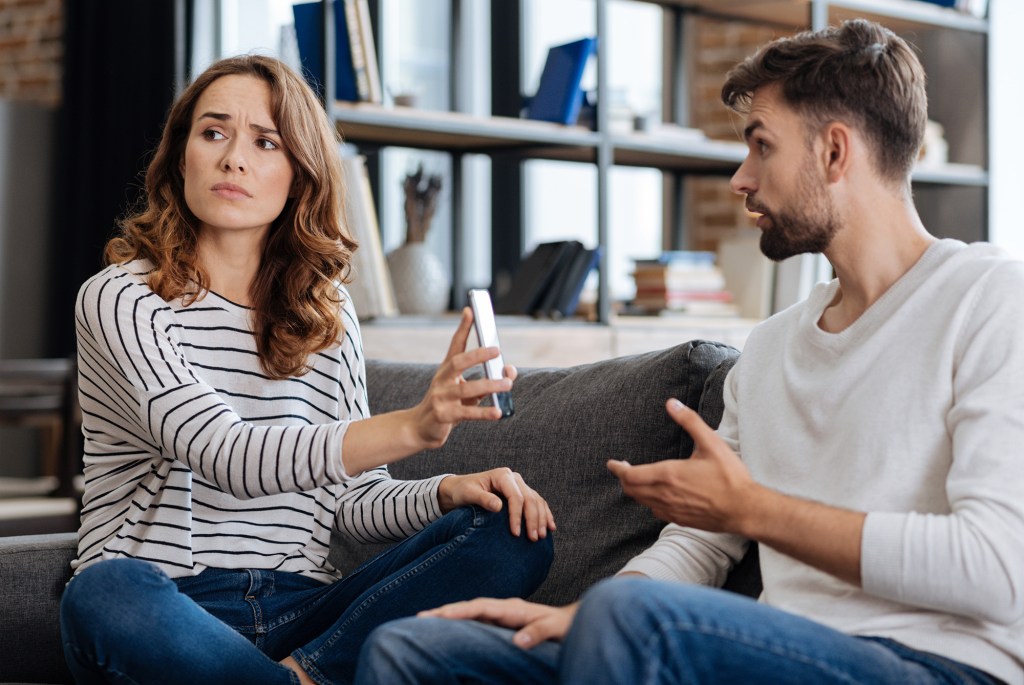 A partner hiding their phone could be a warning sign for cheating.