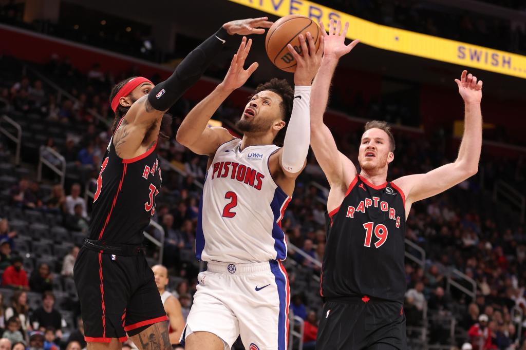 Cade Cunningham, who scored a team-high 30 points, drives to the basket during the Pistons' historic skid-busting victory.