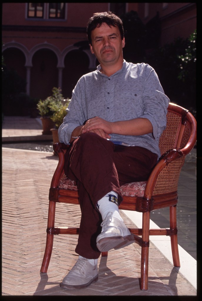 The Irish movie director Neil Jordan sits in a garden in Venice, Italy. Jordans credits include The Crying Game, We're No Angels and Interview With The Vampire. (Photo by Kurt Krieger/Corbis via Getty Images)