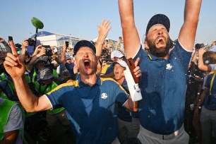 Justin Rose (left) celebrates with Jon Rahm after Team Europe's win over the US in this year's Ryder Cup in Rome in September. Rose said it was "a big blow" for the PGA Tour to lose Rahm to LIV Golf.