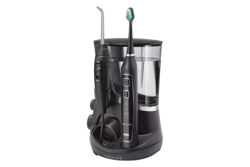 A electric toothbrush and water flosser machine.