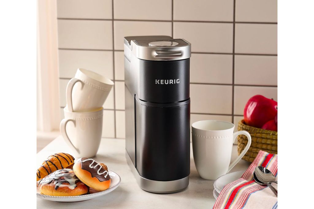 A keurig machine on a countertop. 