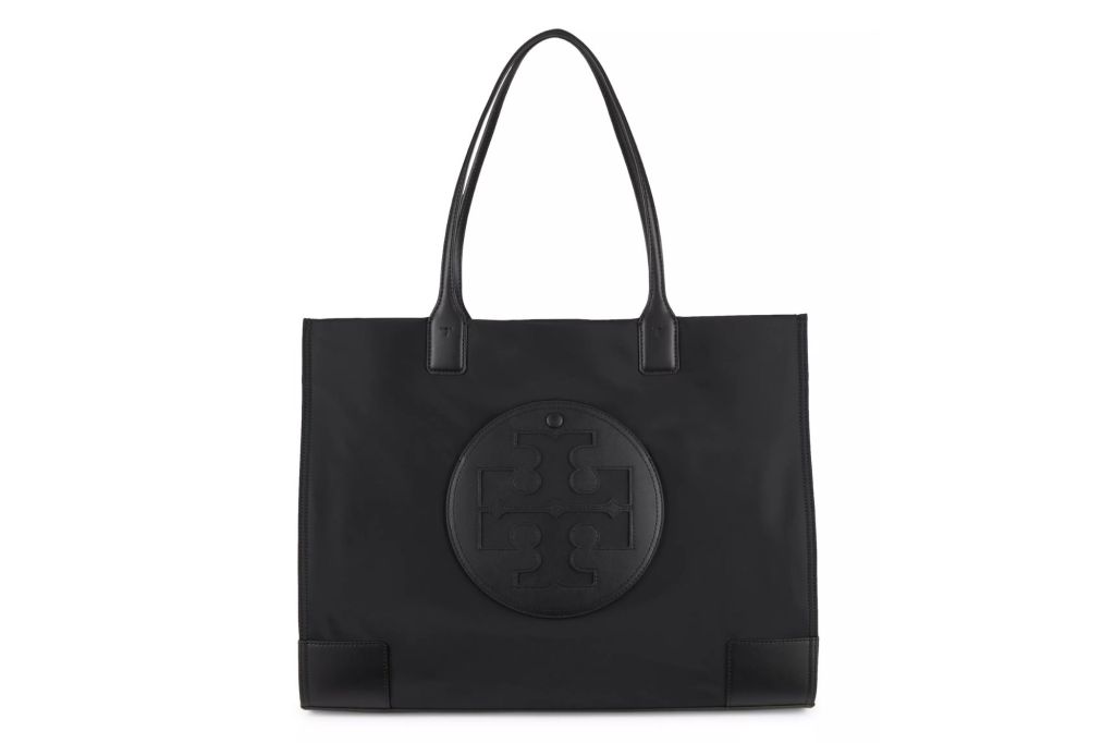 A black Tory Burch tote with the Tory Burch logo at the center.