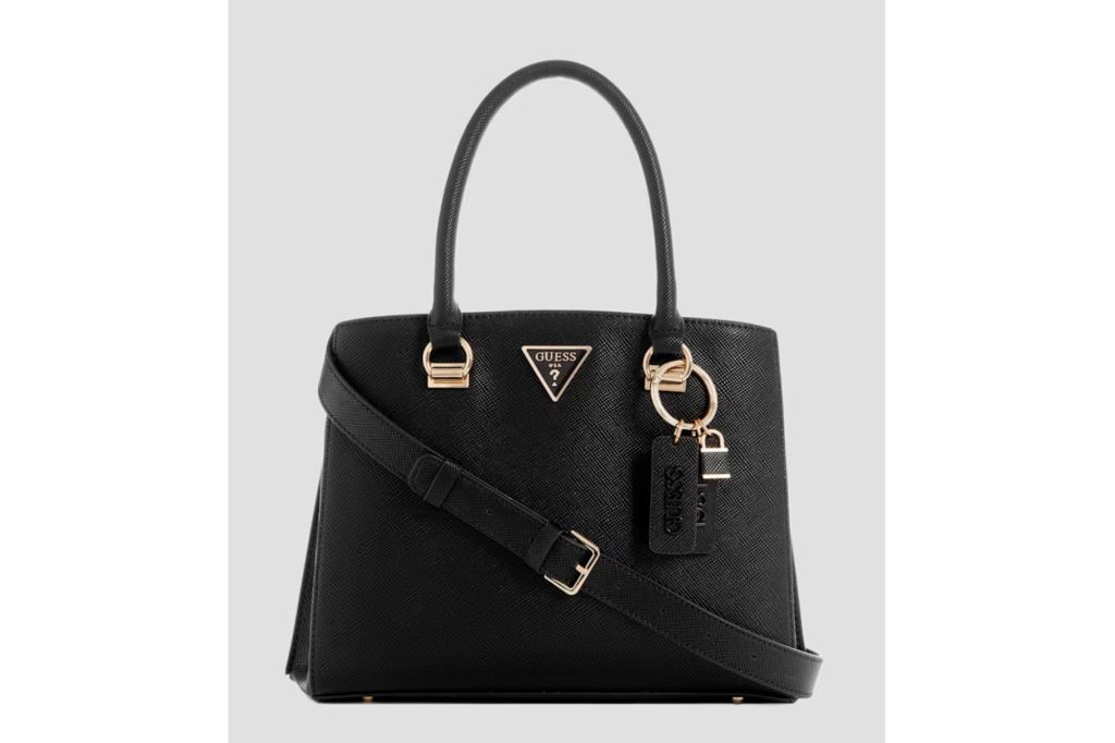 A black tote bag with metal hardware. 
