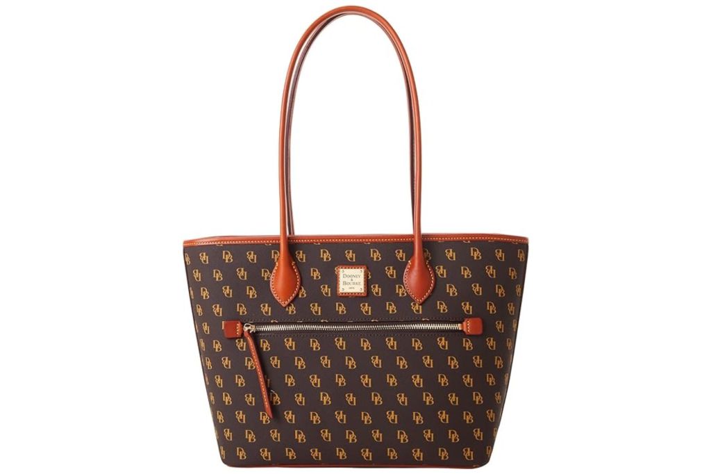 A tote back with a Dooney & Burke logo print.