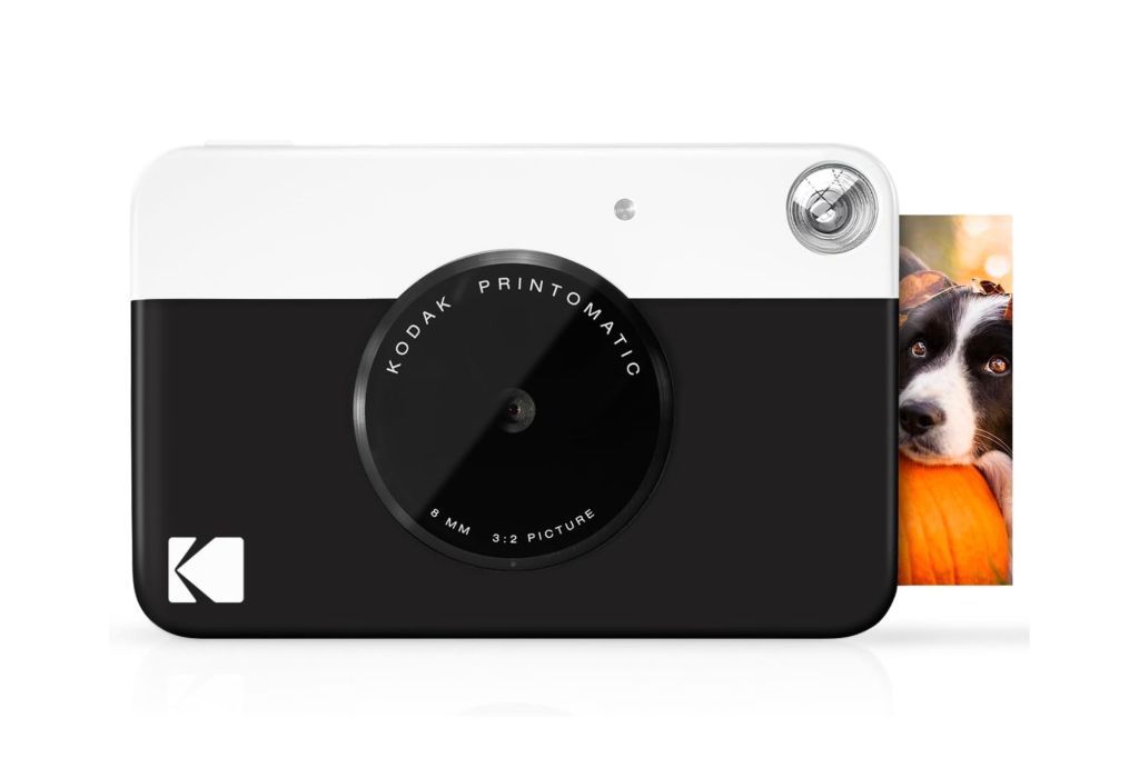 Best Gift Ideas for Men - a black and white camera with a dog on it.