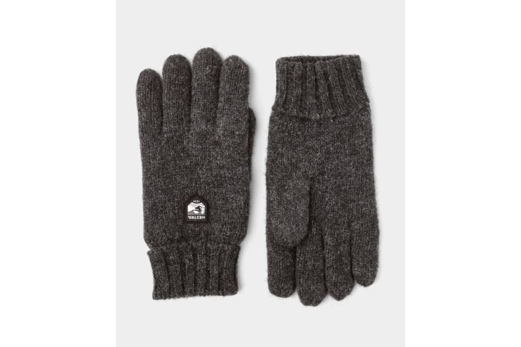 A pair of grey wool gloves.