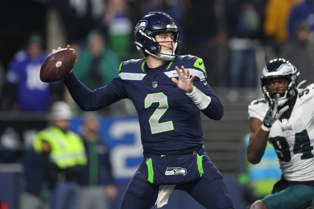 Drew Lock #2 of the Seattle Seahawks looks to pass in the second half at Lumen Field.