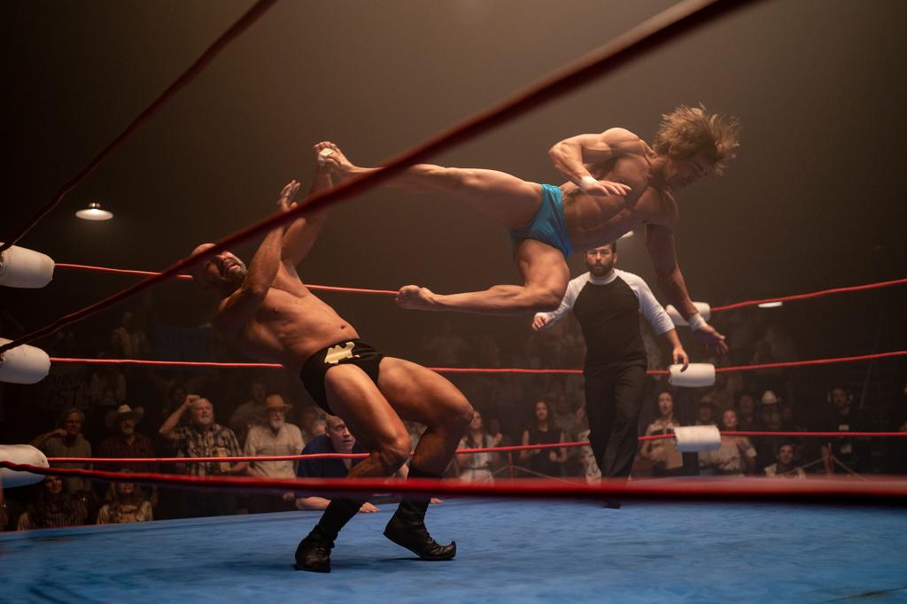 Zac Efron wrestling another actor in The Iron Claw