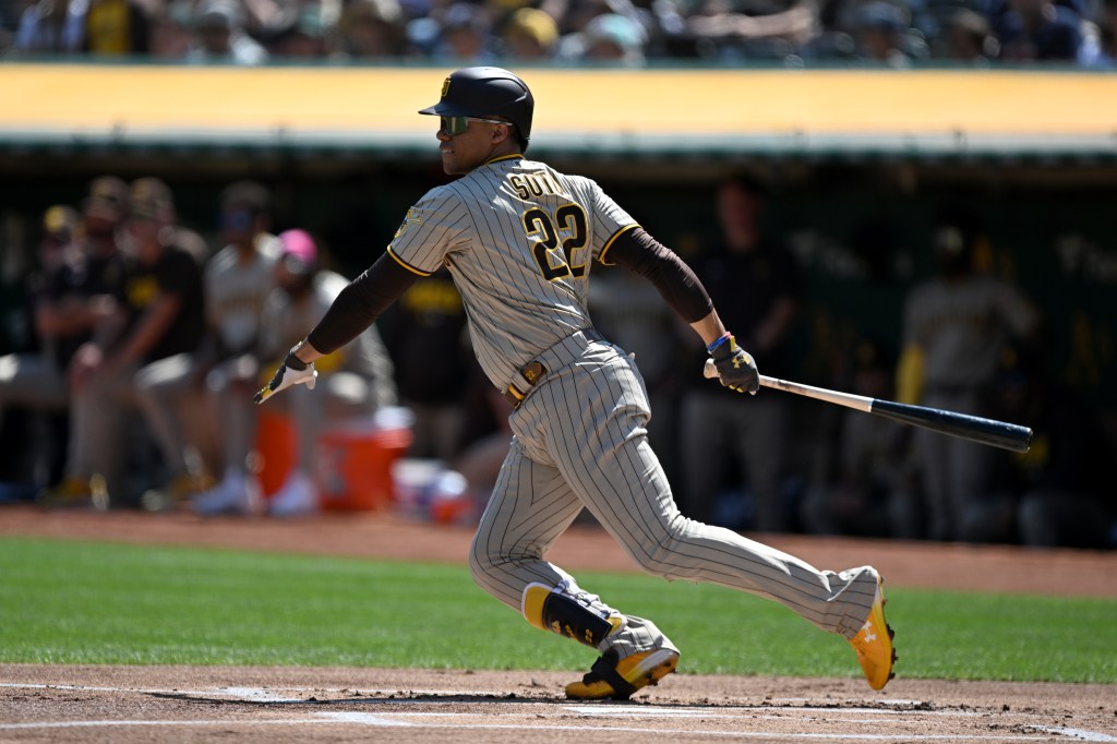 Juan Soto #22 of the San Diego Padres hits a single against the Oakland Athletics 