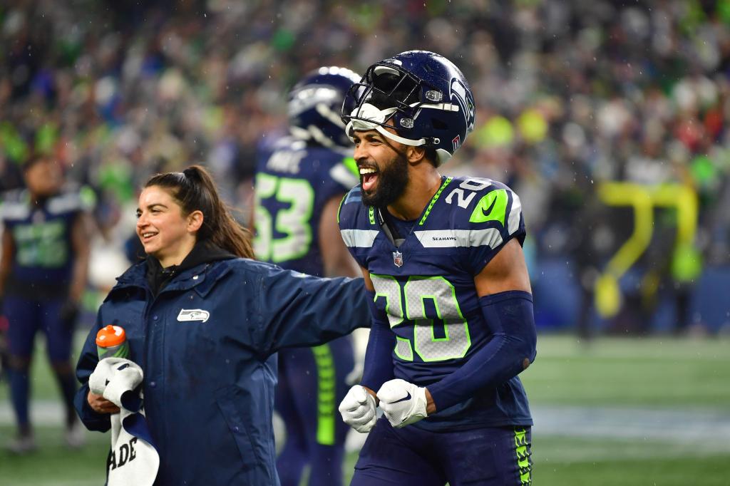 Julian Love #20 of the Seattle Seahawks celebrates after a victory against the Philadelphia Eagles.