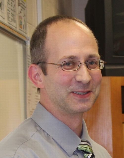 Headshot of teacher Benjamin Reese.