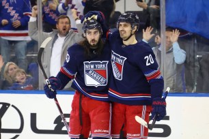Mika Zibanejad #93 of the New York Rangers celebrates with Chris Kreider #20 of the New York Rangers after Zibanejad scores a goal during the third period when the New York Rangers defeated the Anaheim Ducks 5-1 Friday, December 15, 2023