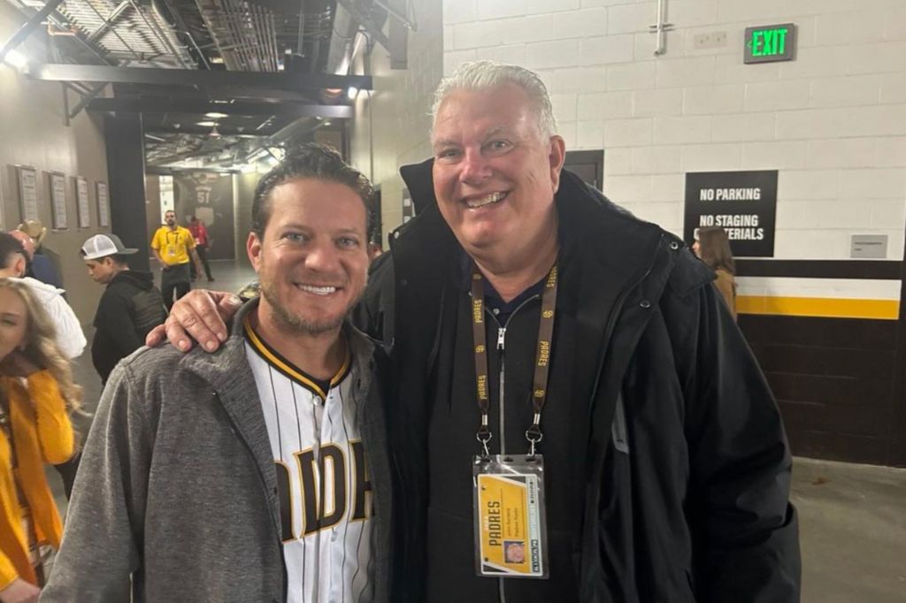 John Kentera (right), pictured with former Padres pitcher Jake Peavy, was let go from 97.3 The Fan in San Diego last week.