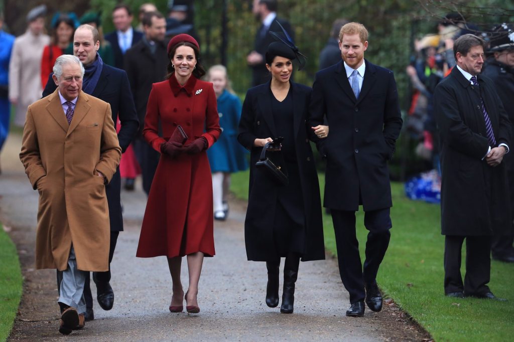 King Charles, Prince William, Princess Kate, Meghan Markle, and Prince Harry are seen in 2018.