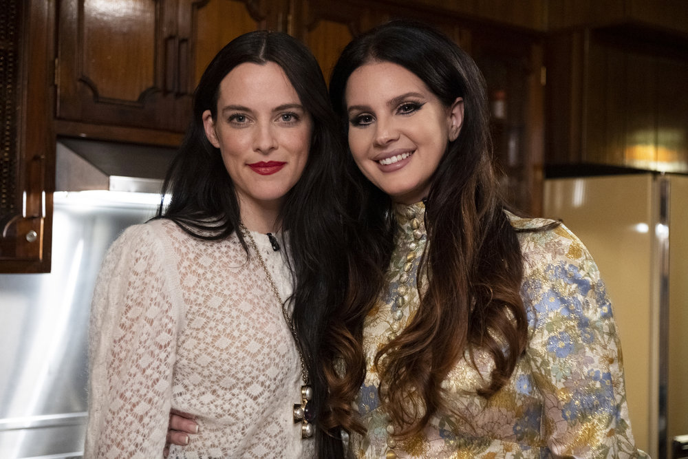 Riley Keough (left) with Lana Del Rey smiling. 