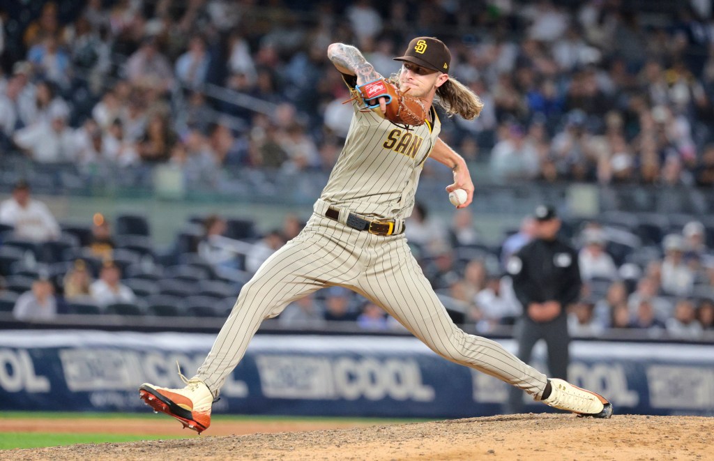 adres relief pitcher Josh Hader #71, pitching in the 9th inning.