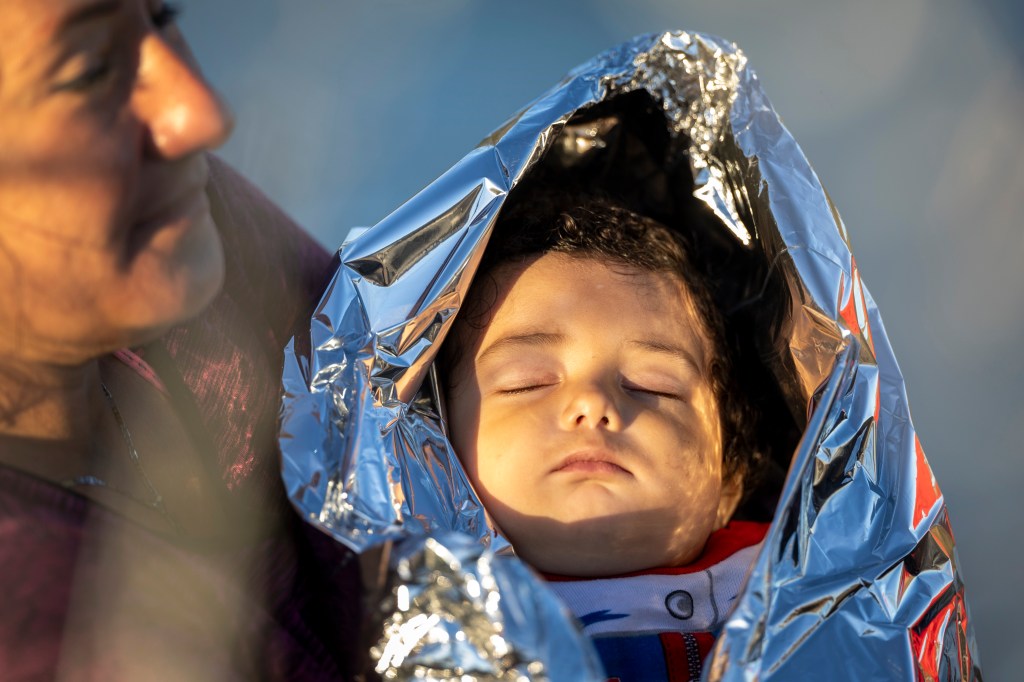 a baby in a foil blanket