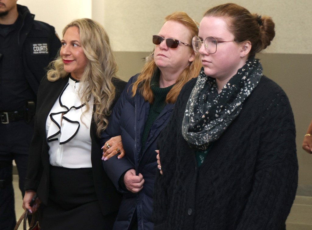 Rex Heuermann's wife Asa Ellerup and daughter Victoria Heuermann leave Riverhead court after a hearing for Rex Heuermann.