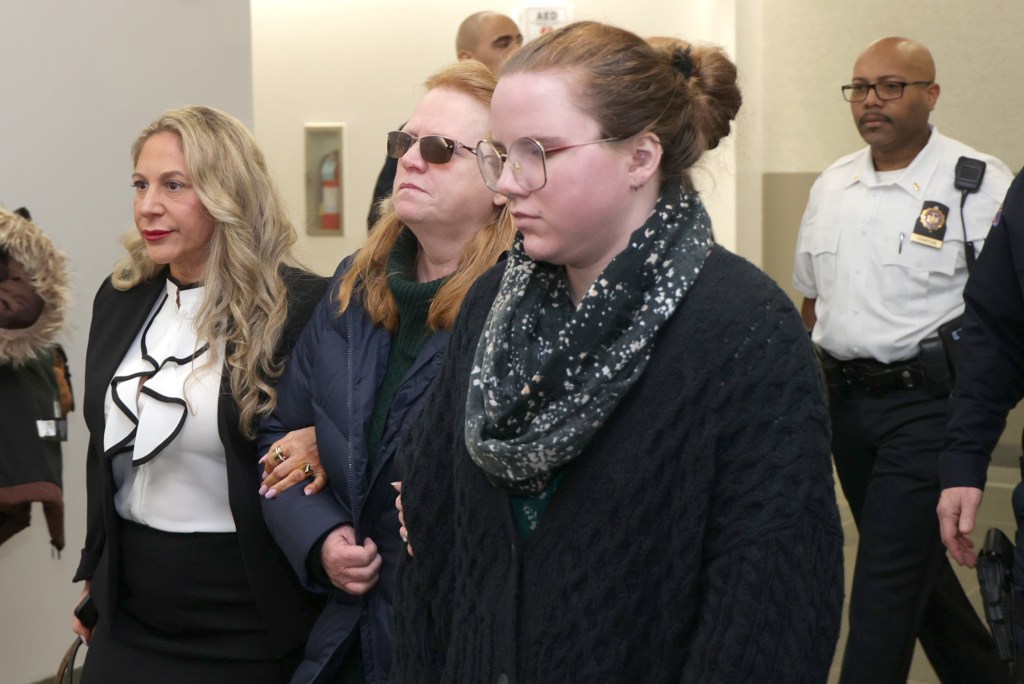 Rex Heuermann's wife Asa Ellerup and daughter Victoria Heuermann leave Riverhead court after a hearing for Rex Heuermann.