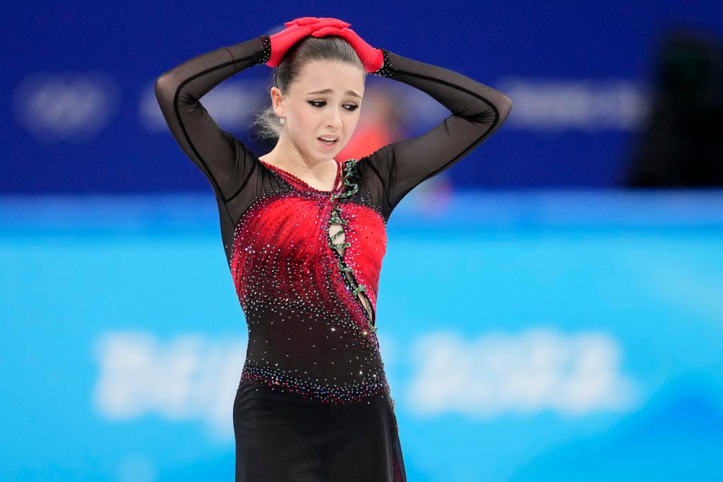 Kamila Valieva, 15, of the Russian Olympic Committee, reacts after the women's team free skate program during the figure skating competition at the 2022 Winter Olympics