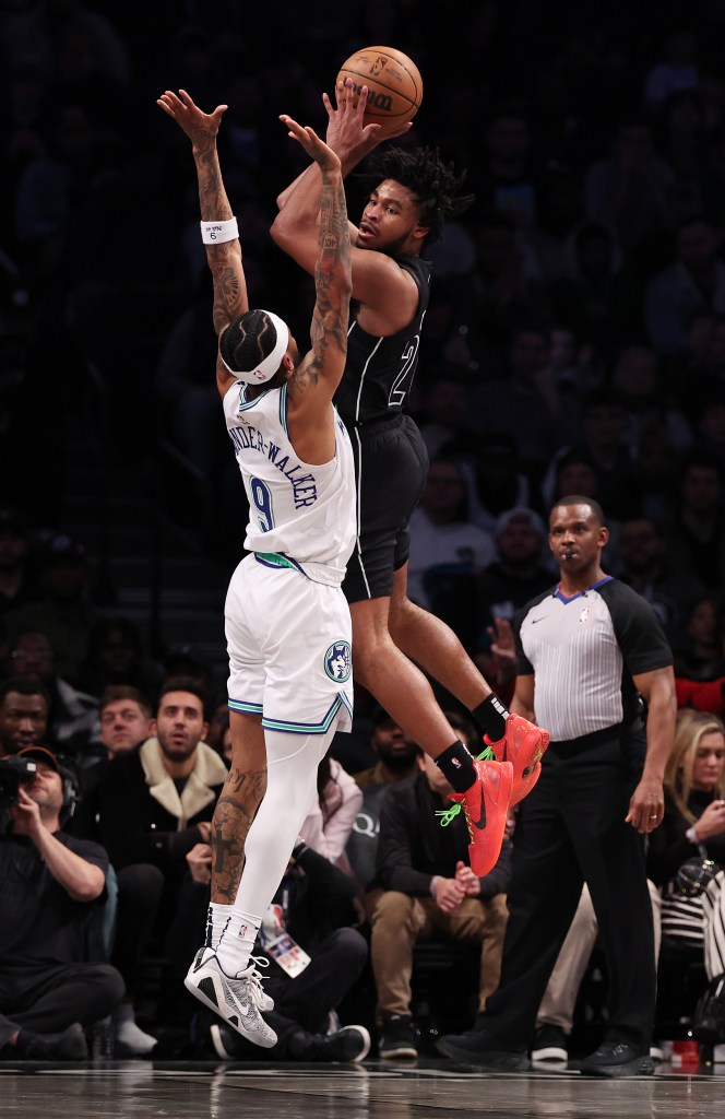 Cam Thomas #24 of the Brooklyn Nets in action against Nickeil Alexander-Walker