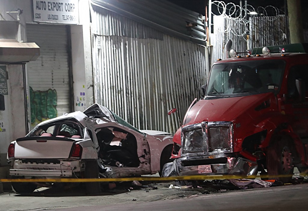 A white Chrysler 300M with U-Haul markings was involved in a fatal crash near the intersection of Bryant and Viele Avenues in the Bronx early Sunday, Jan. 21, 2024.