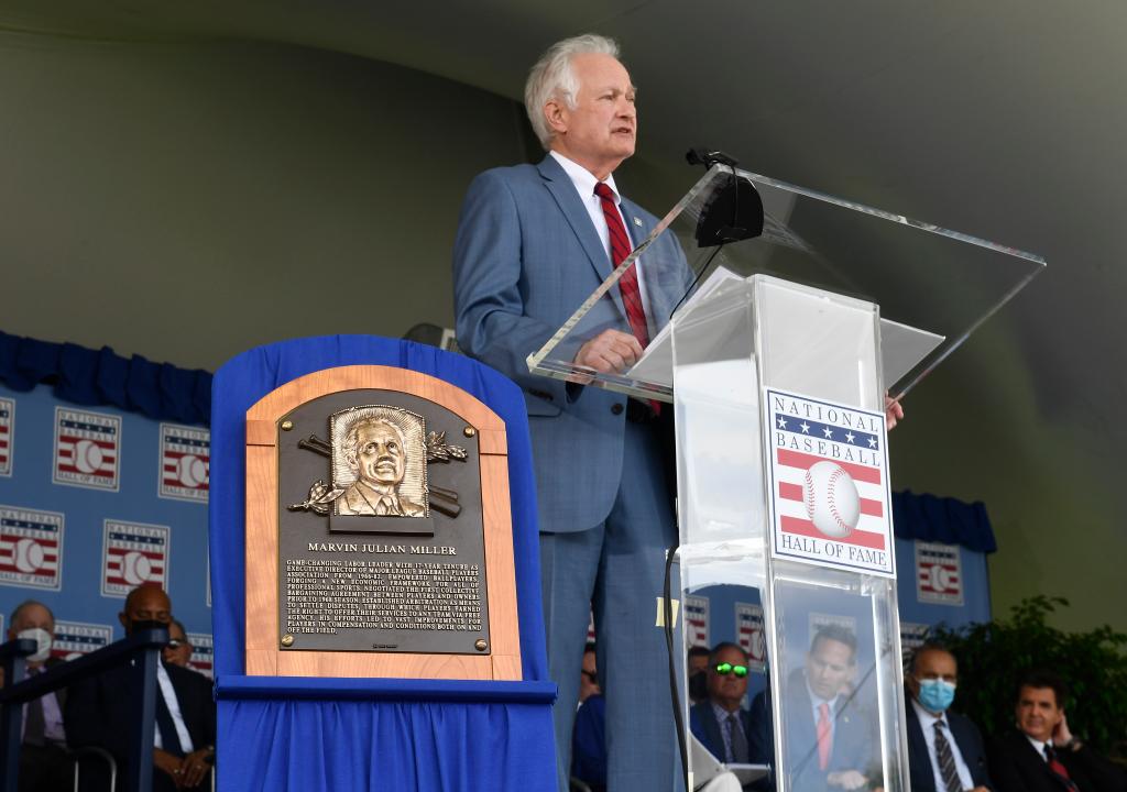 Donald Fehr, accepting for the late Marvin Miller, speaks about Miller, who was inducted into the Baseball Hall fo Fame on Wednesday, Sept. 8, 2021, in Cooperstown, N.Y. 