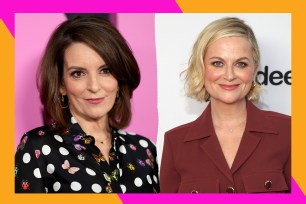 Tina Fey (L) and Amy Poehler pose on the red carpet.