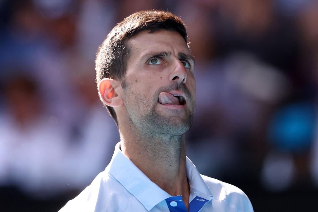 Novak Djokovic reacts in frustration during his four-set loss in the Australian Open semifinals.