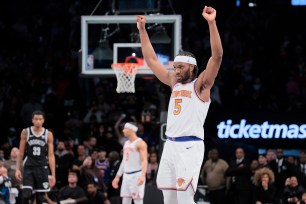 Precious Achiuwa, who played big minutes in the place of the injured Isiah Hartenstein, celebrates during the Knicks' 108-103 win over the Nets.