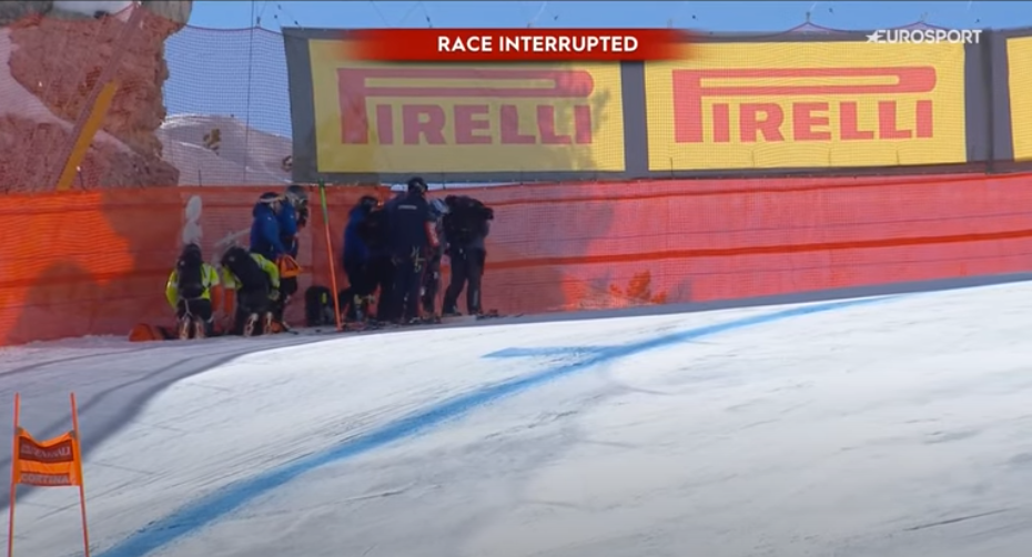 Medics tended to Shiffrin as the race was delayed over 20 minutes.