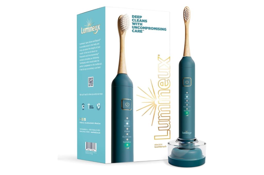 Best Electric Toothbrushes - a blue toothbrush in a box.