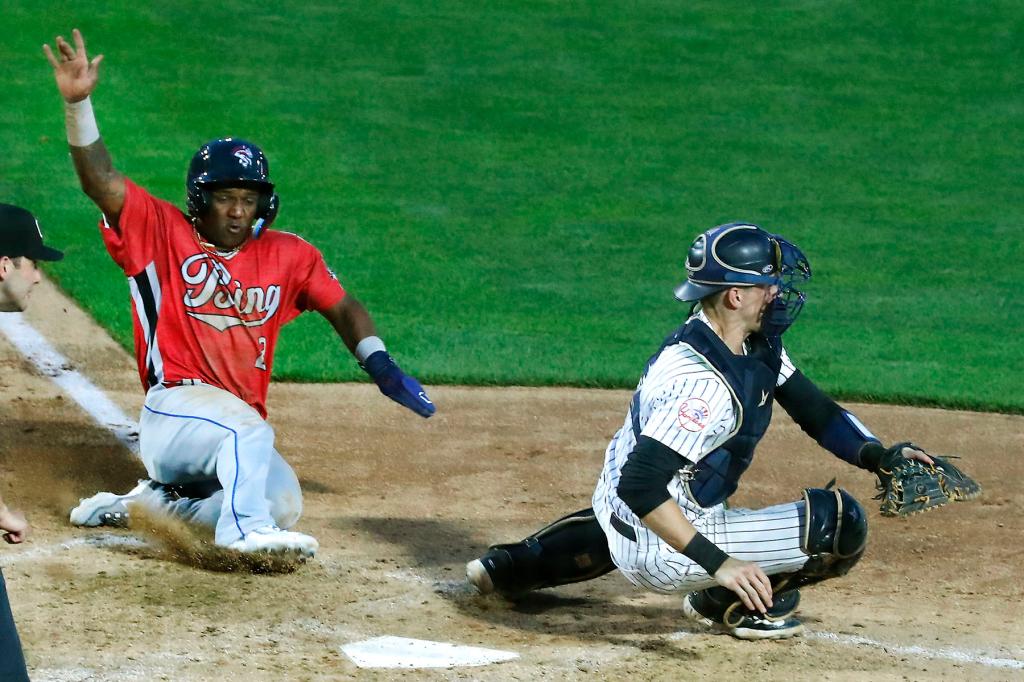 Luisangel Acuna of the Binghamton Rumble Ponies, scores against Ben Rice during the seventh inning against the Somerset Patriots in Bridgewater, N.J. Wednesday, August 8, 2023. 