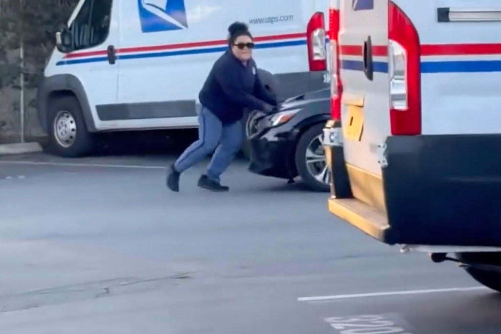 Video shows postal worker trying to stop a getaway car carrying a trio of mail thieves