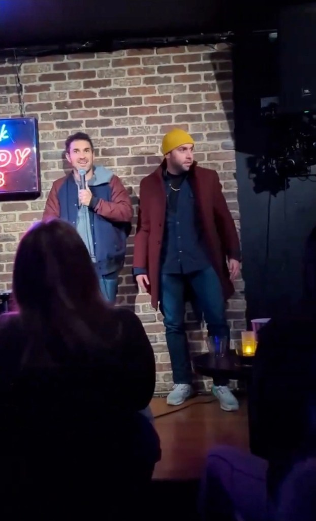 Mark Normand was in the middle of his set when the strange man hoped on stage next to him.