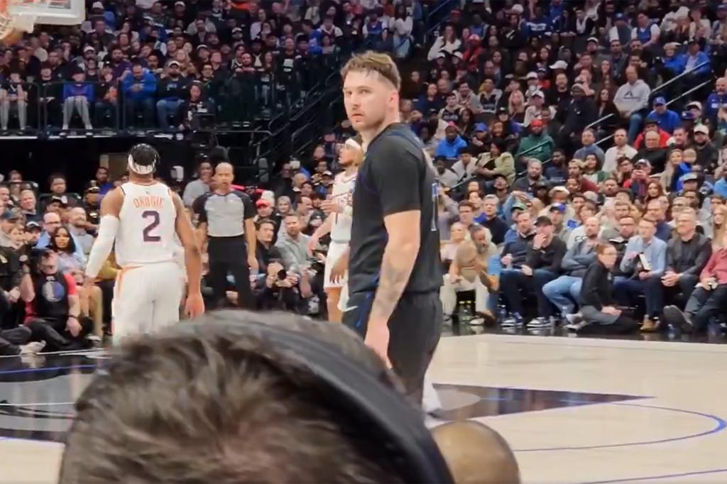 Luke Doncic stared at his heckler during the third quarter of the Mavericks' loss to the Suns on Wednesday.