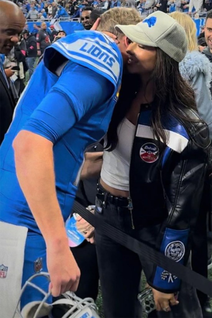 Christen Harper and Jared Goff share a sweet moment on the sidelines before the Buccaneers divisional round game on January 21, 2024. 