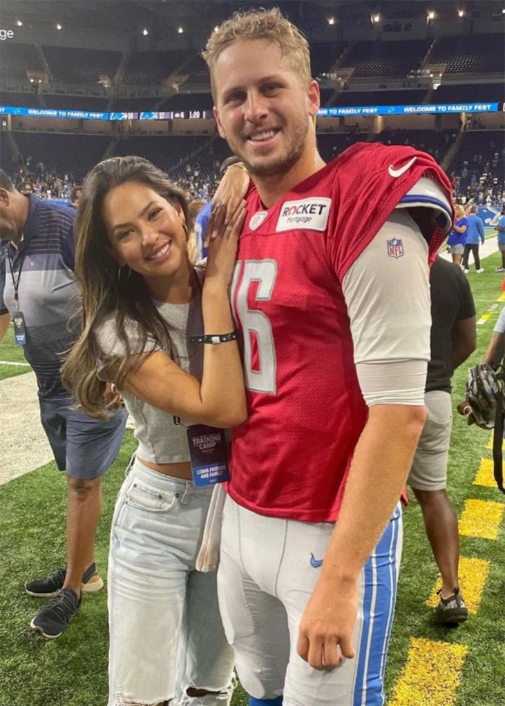 Christen Harper and Jared Goff on the sidelines at Ford Field during family day in 2022. 