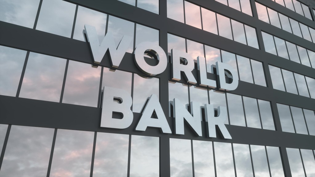 World Bank sign on a modern glass skyscraper. 