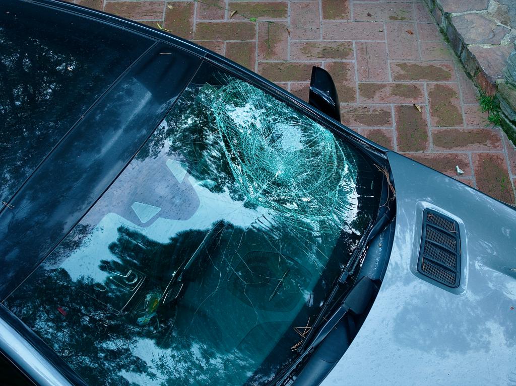 The chaos of the attack left the actor's car significantly damaged with a shattered windshield and side-view mirror.