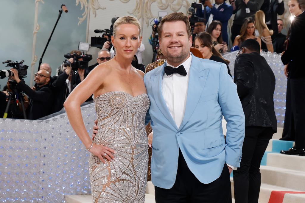 James Corden smiling with his wife, Julia. 
