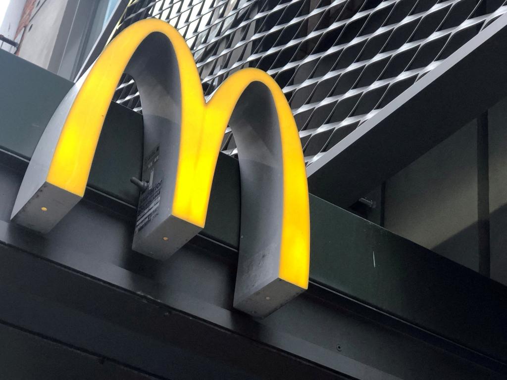 FILE PHOTO: The McDonald's logo is seen outside the fast-food chain McDonald's in New York, U.S., October 22, 2019. REUTERS/Shannon Stapleton/File Photo