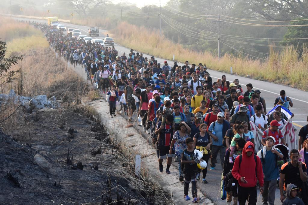A band of hundreds of migrants marching through Mexico to the southern United States border on Monday