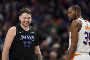 Luka Doncic and Kevin Durant during the Dallas Mavericks vs Phoenix Suns basketball game.