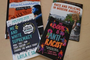 Books on race for young children are displayed at at the Queens Public Library.