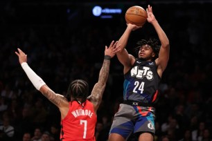 Cam Thomas, shooting a jumper during the Nets' win over the Rockets, said he and his Nets teammates aren't engaging in any trade deadline talk.