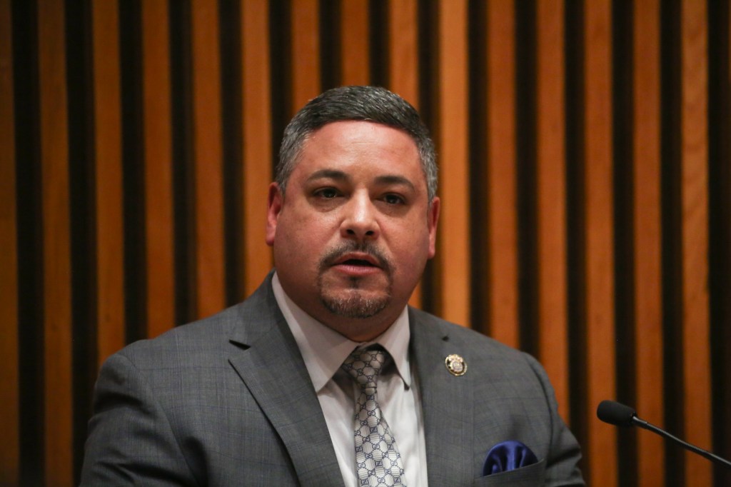 NYPD Commissioner Edward Caban at a press conference.