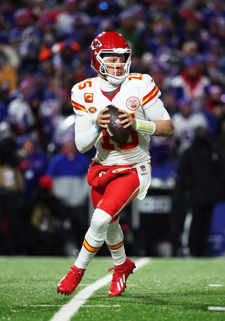 Patrick Mahomes #15 of the Kansas City Chiefs in action against the Buffalo Bills during their AFC Divisional Playoff game at Highmark Stadium on January 21, 2024 in Orchard Park, New York.   