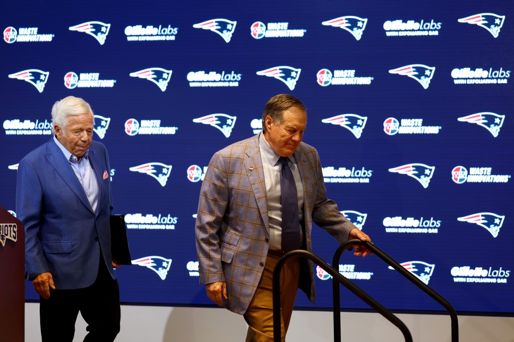 Bill Belichick walks off the stage at his final Patriots press conference.